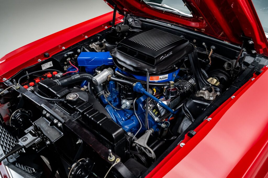 428 Cobra Jet V8 with Shaker hood scoop in a factory R-code 1969 Ford Mustang Mach 1, sold by RK Motors